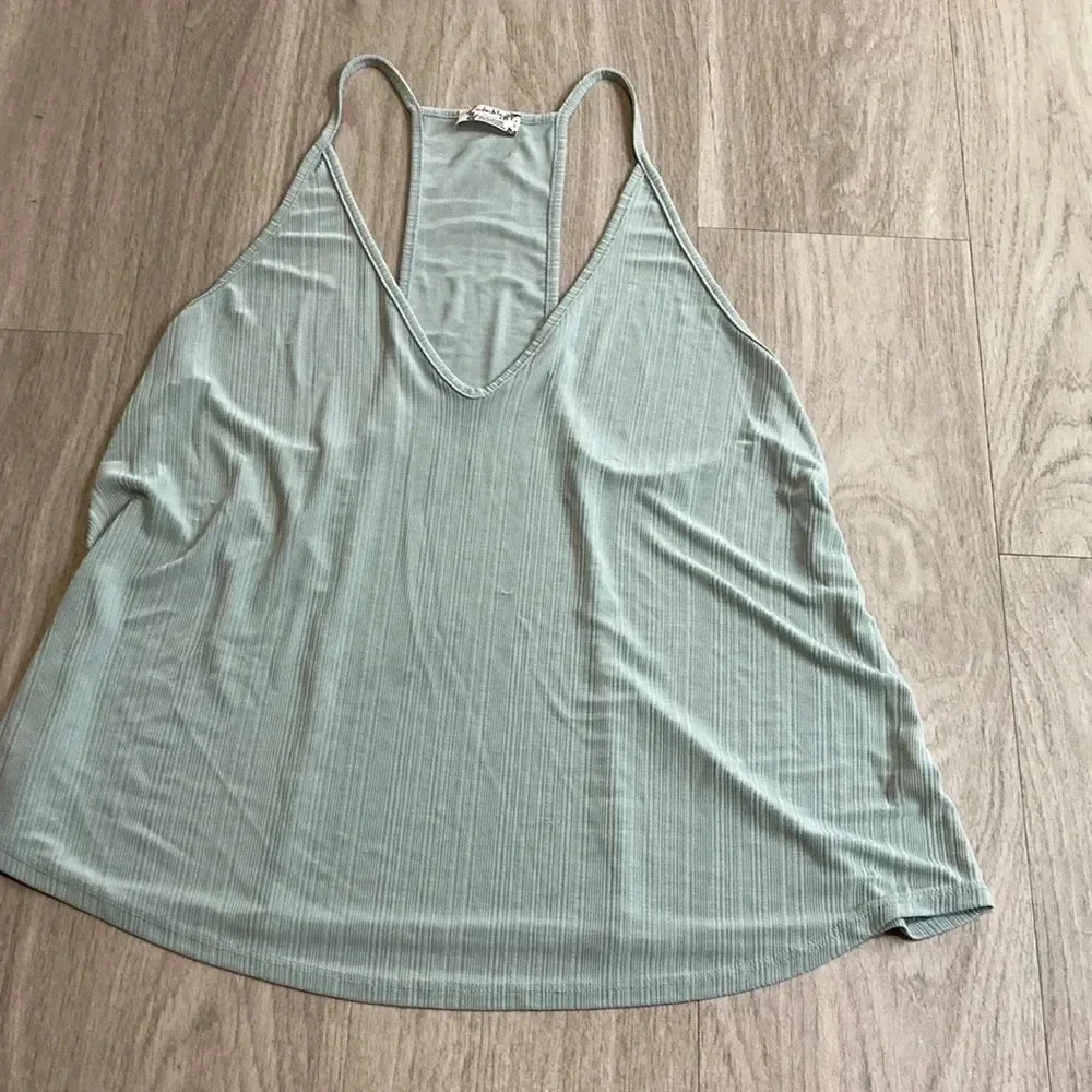 🍀 FREE PEOPLE SLINKY TANK